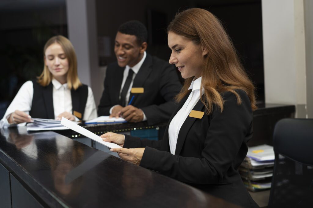 Free photo receptionists in elegant suits during work hours
